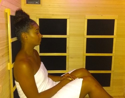 AGLOW Guest Enjoying Infrared Sauna
